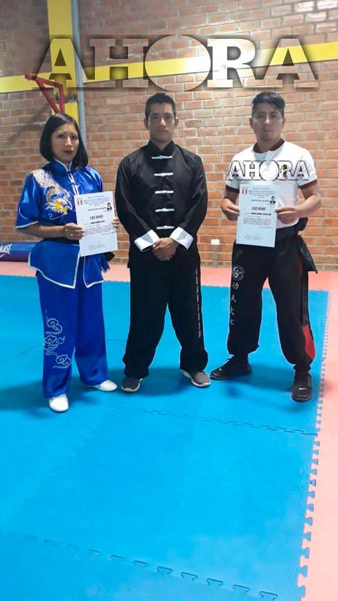 Dos huanuqueños se gradúan de faja negra en kung fu